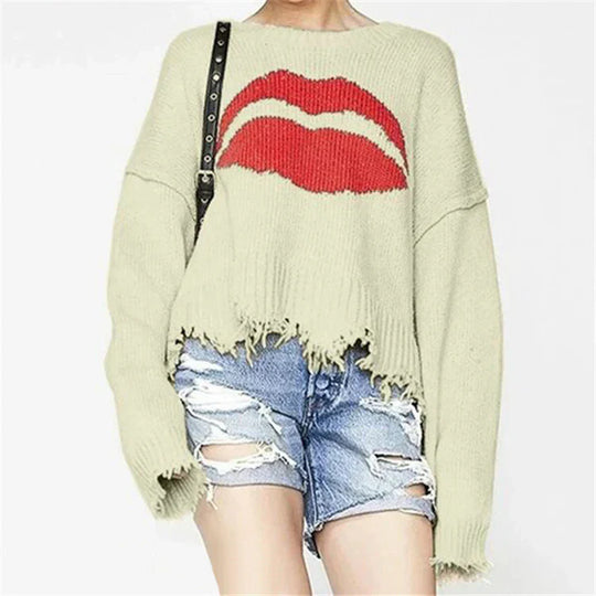 Damski sweter – Oversized krój – Grube dzianie – Wzór ust – Frędzlowy dół – Krótki model