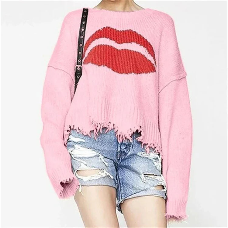 Damski sweter – Oversized krój – Grube dzianie – Wzór ust – Frędzlowy dół – Krótki model