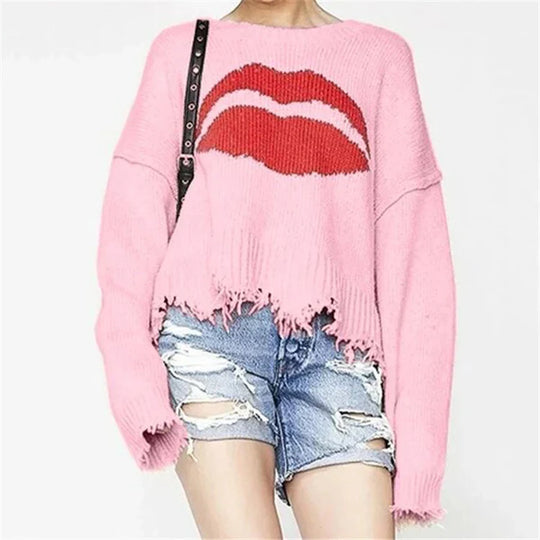 Damski sweter – Oversized krój – Grube dzianie – Wzór ust – Frędzlowy dół – Krótki model