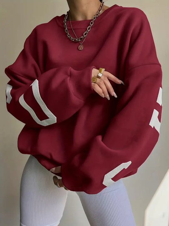 Damska Oversized Bluza – Komfortowy Krój – Okrągły Dekolt – Graficzne Rękawy – Styl Casual
