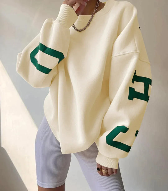 Damska Oversized Bluza – Komfortowy Krój – Okrągły Dekolt – Graficzne Rękawy – Styl Casual