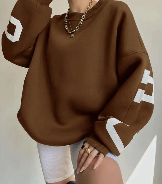 Damska Oversized Bluza – Komfortowy Krój – Okrągły Dekolt – Graficzne Rękawy – Styl Casual
